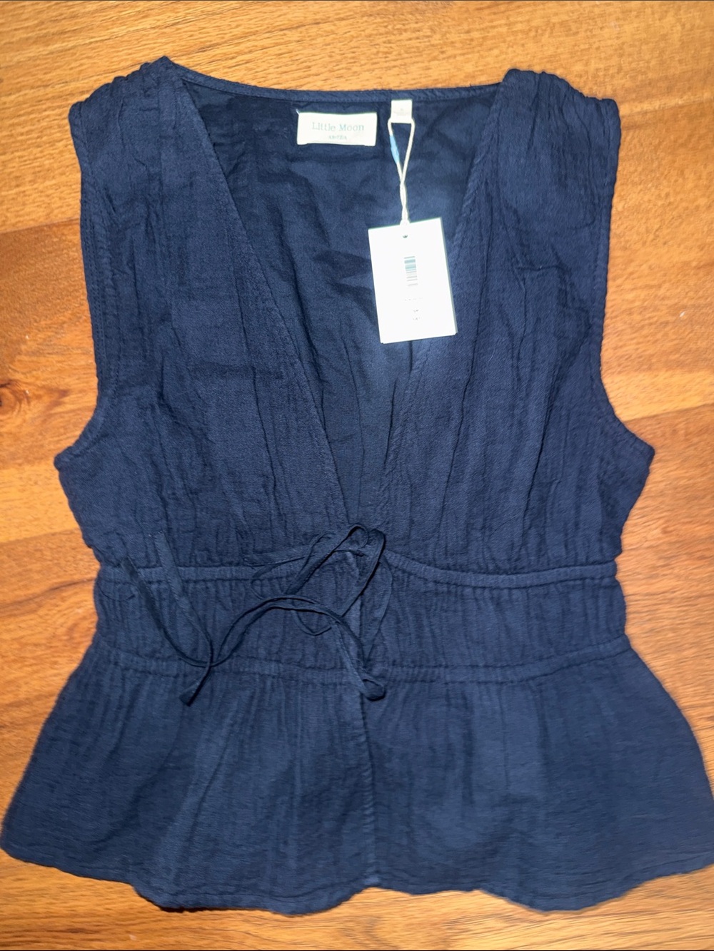 Monterosso Textured Sleeveless V-Neck Tie-Waist Peplum Little Moon Aritzia